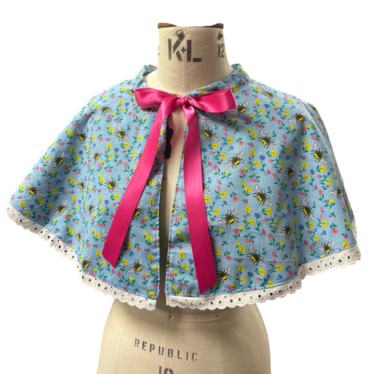 “Miriam” Capelet with lace trim in blue floral and bees