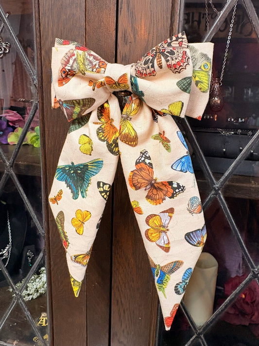 “Alice” Bow Hair Barrette in Entomology fabric