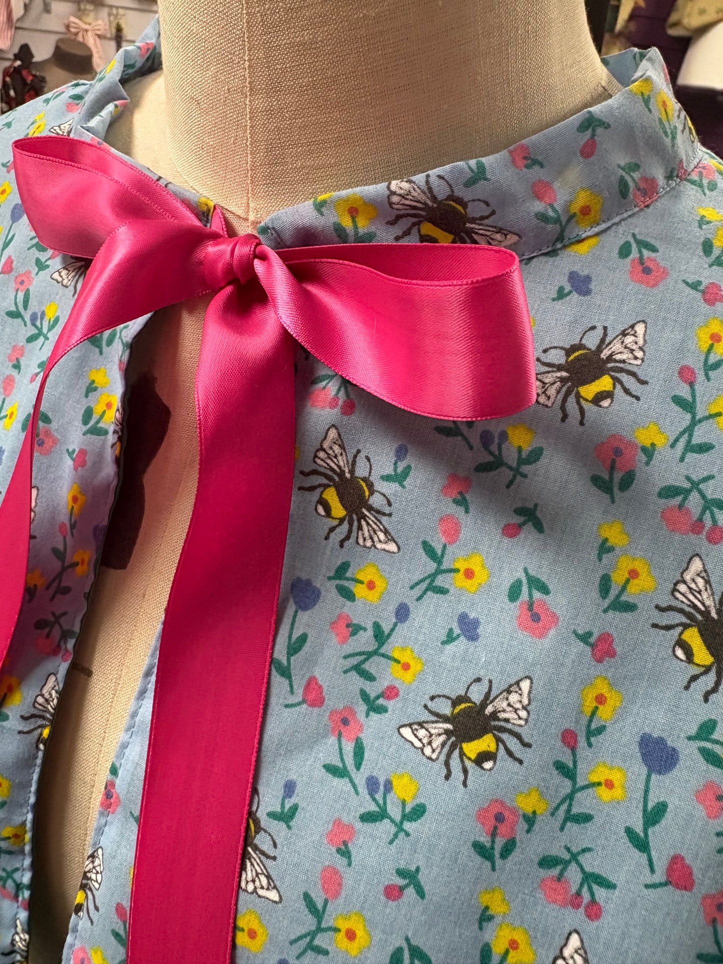 “Miriam” Capelet with lace trim in blue floral and bees