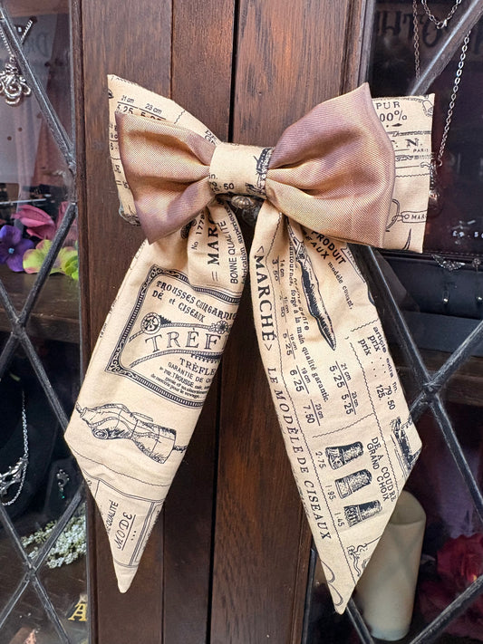 “Alice” Bow Hair Barrette in Haberdashery and gold fabric