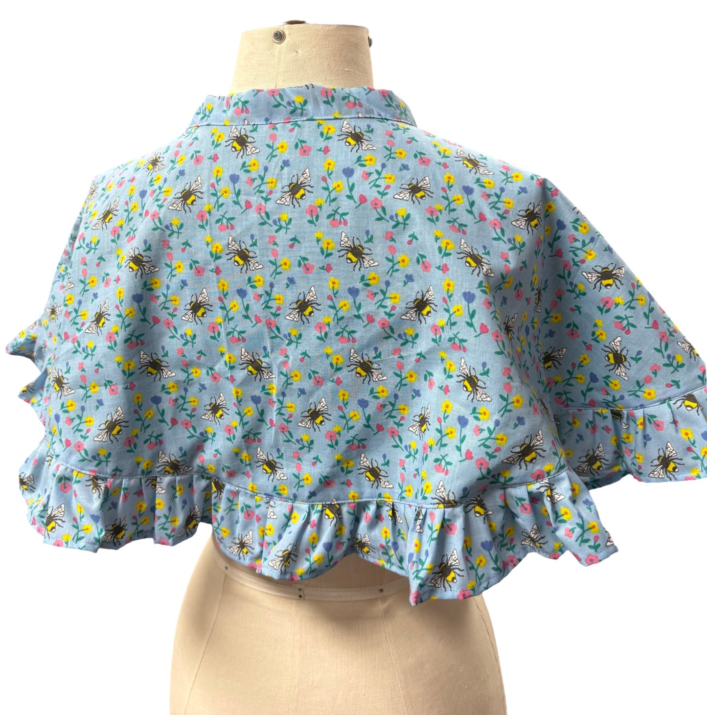 “Miriam” Capelet with ruffle in blue floral and bees