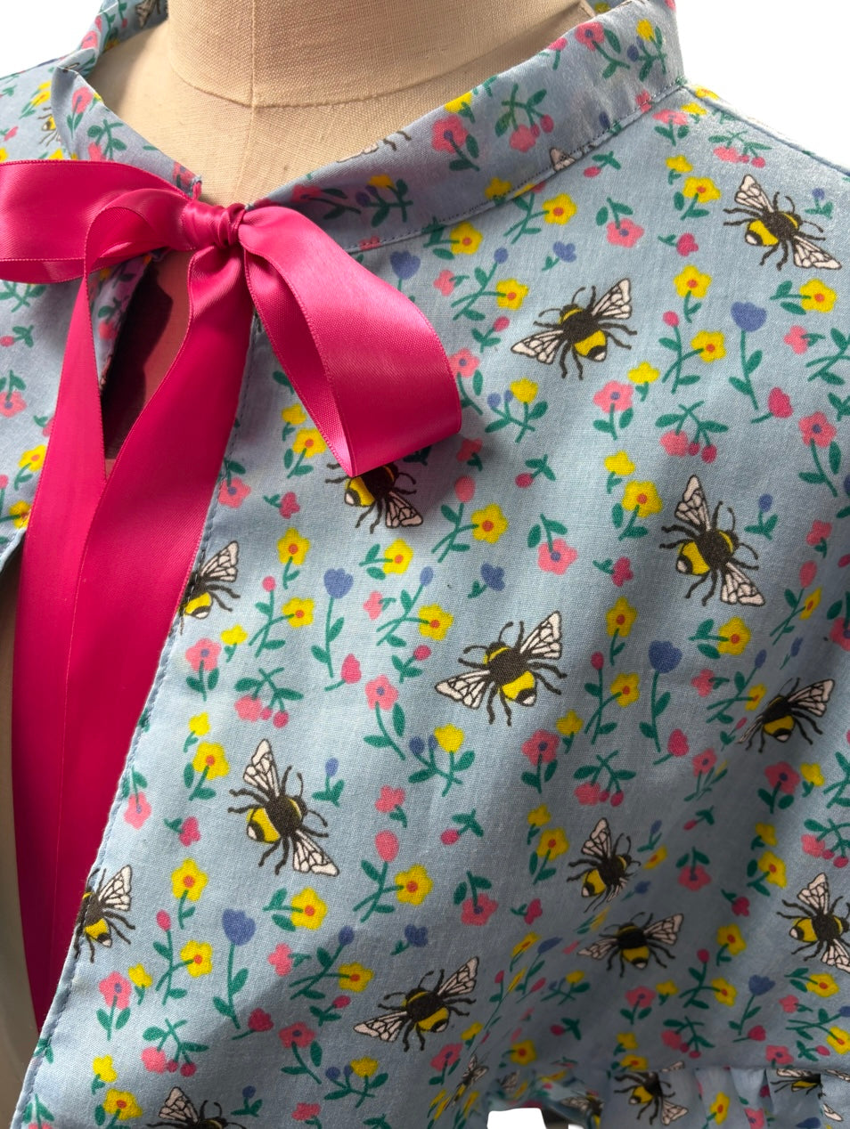 “Miriam” Capelet with ruffle in blue floral and bees